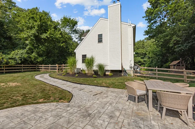 a view of a swimming pool with a lounge chairs