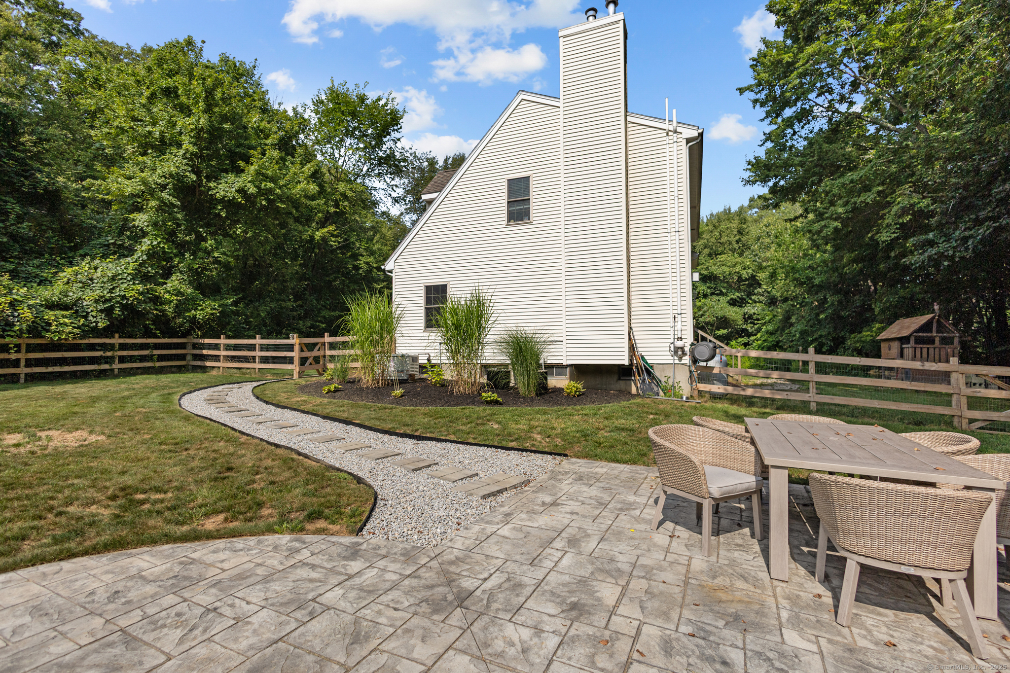 433 Fabyan Road Thompson, CT 06255 - Photo 31 of 39 a view of a swimming pool with a lounge chairs