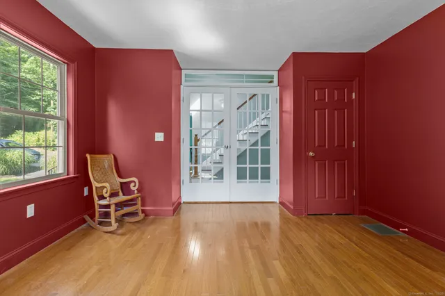 a view of a livingroom with furniture and wooden floor