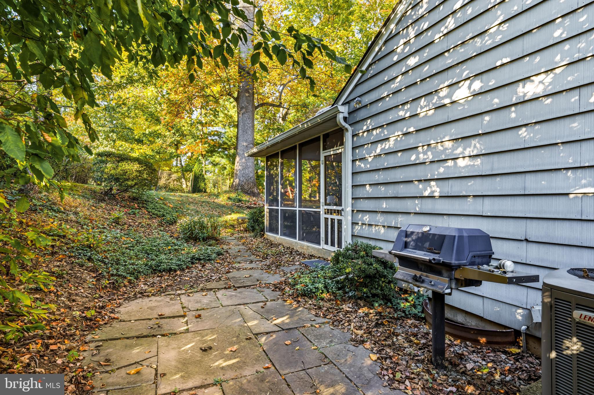 305 Gulph Hills Road Wayne, PA 19087 - Photo 45 of 49 Side Slate patio with built in gas grill