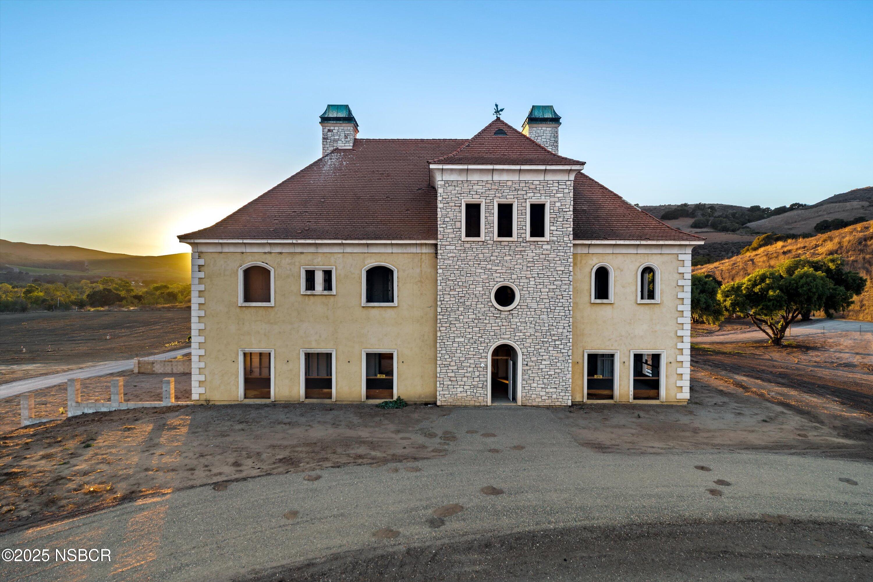 4375 Sweeney Road Lompoc, CA 93436 - Photo 8 of 70 a view of a white house with a yard