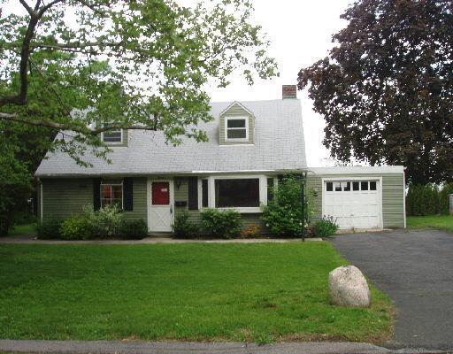 20 Cambridge Road Stamford, CT 06902 - Photo 1 of 1 a front view of a house with garden