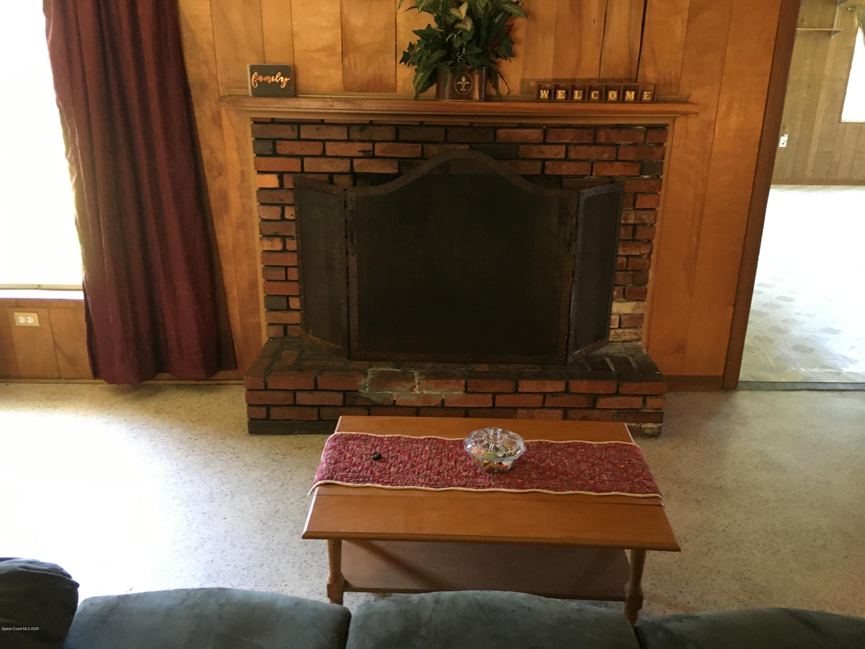 1665 Anson Road Melbourne, FL 32934 - Photo 14 of 31 fireplace