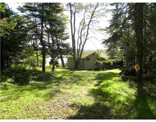 186 Atlantic Quarry Road Spruce Head, ME 04859 - Photo 4 of 17 Exterior Back. View down private...