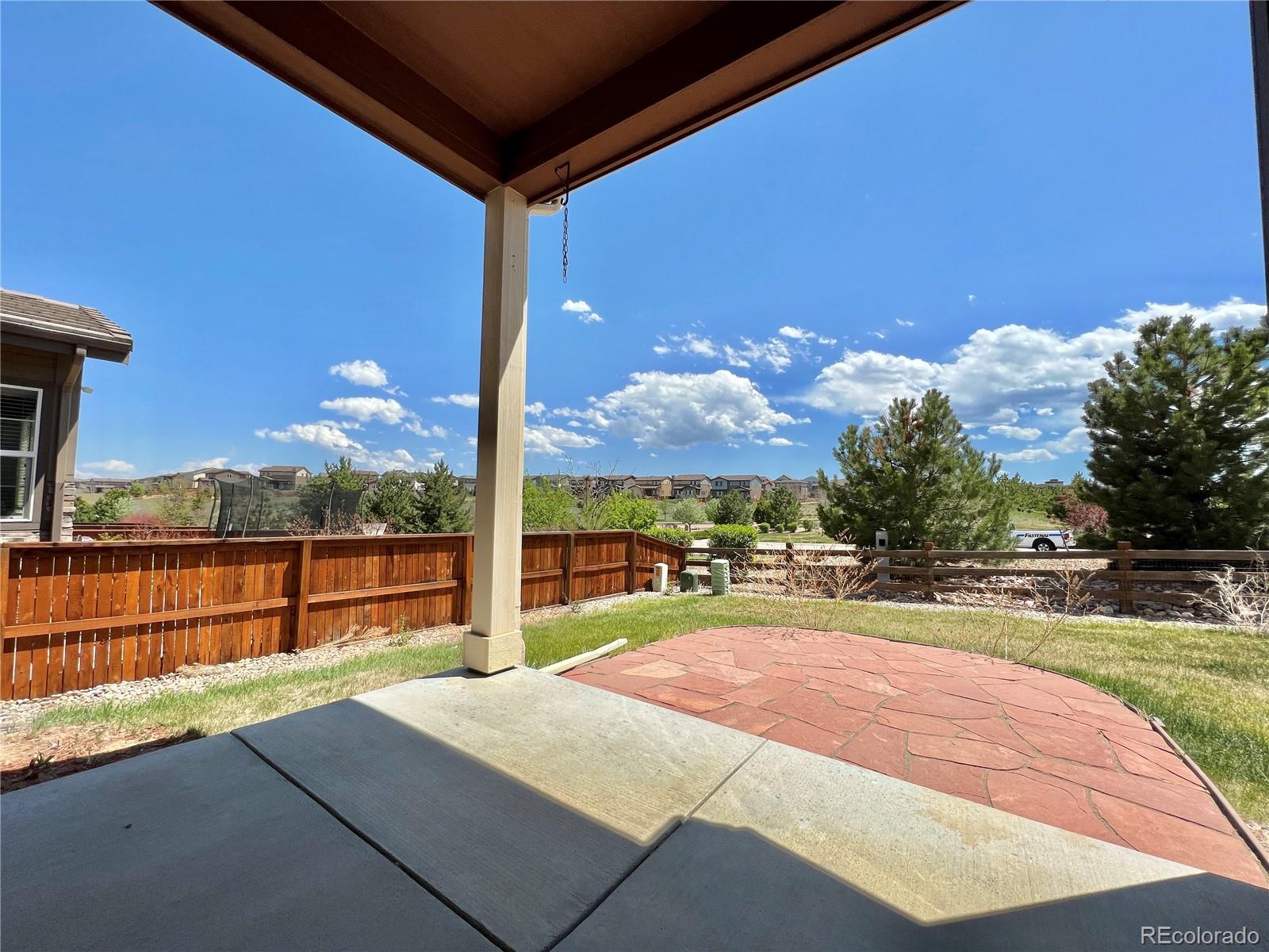 14000 Touchstone Point Parker, CO 80134 - Photo 15 of 19 a view of a swimming pool with a patio