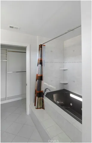 a view of a walk in closet