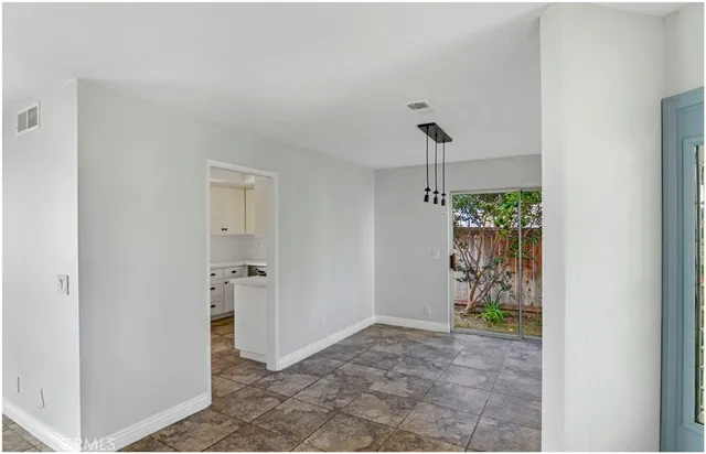 a view of an entryway and a hallway