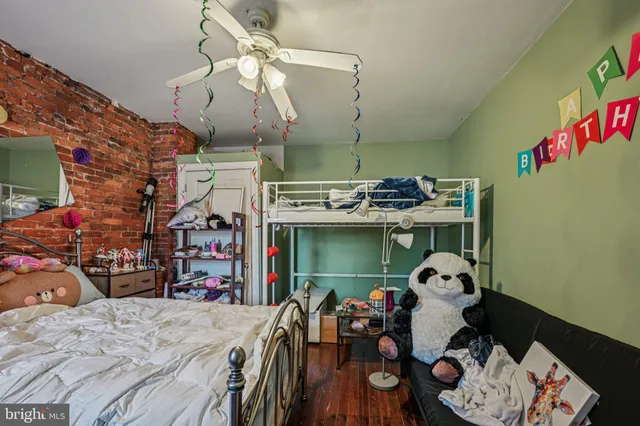 a bedroom with a bed and cabinets