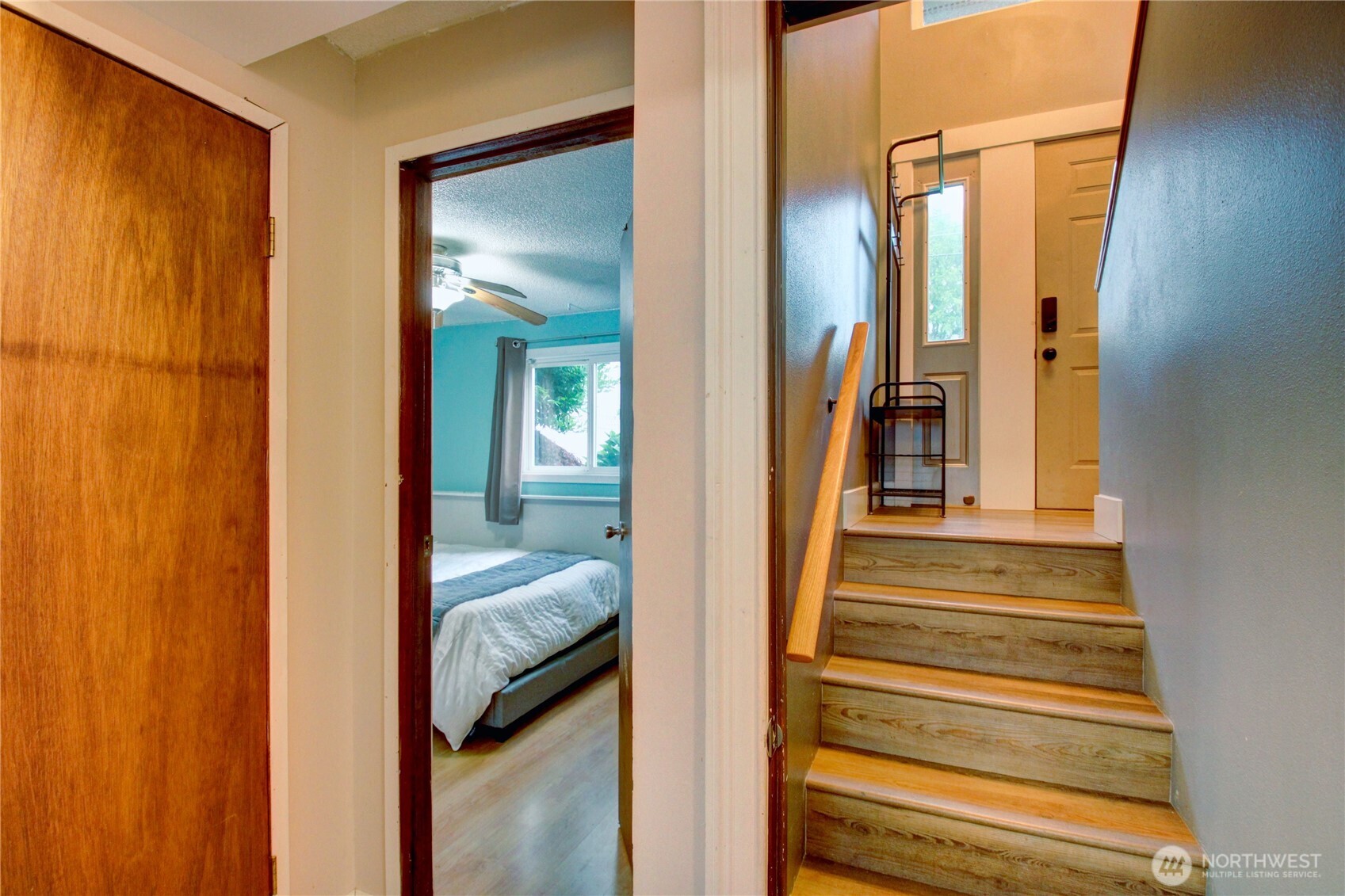 13168 Avon Allen Road Mount Vernon, WA 98273 - Photo 16 of 34 a view of a hallway with wooden floor and staircase