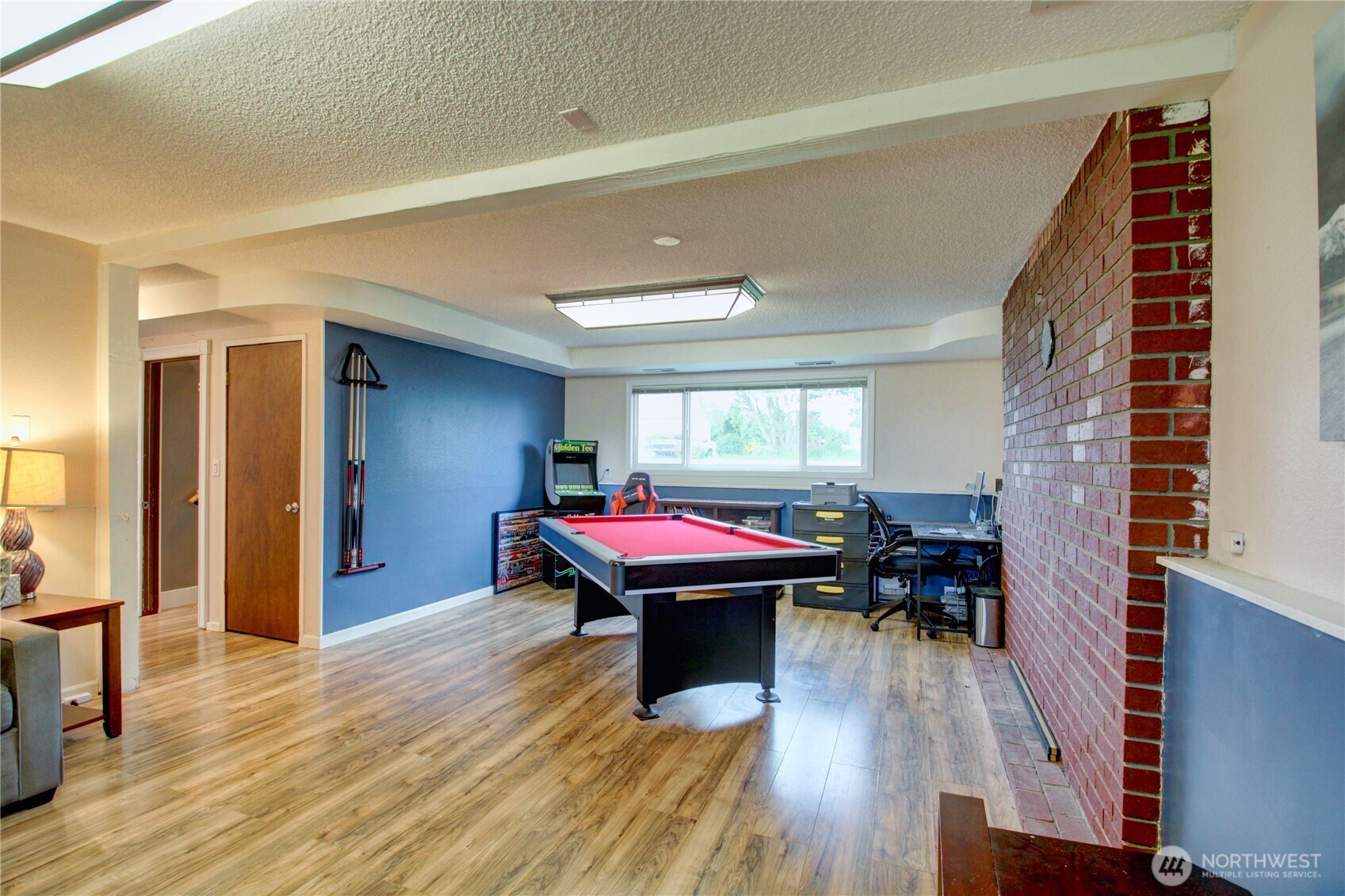 13168 Avon Allen Road Mount Vernon, WA 98273 - Photo 17 of 34 a room with furniture and wooden floor