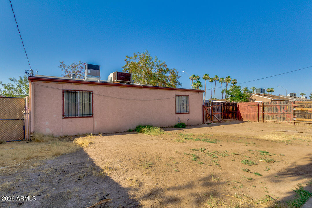 1301 West Indian School Road, Unit B Phoenix, AZ 85013 - Photo 9 of 9 a house view with a outdoor space