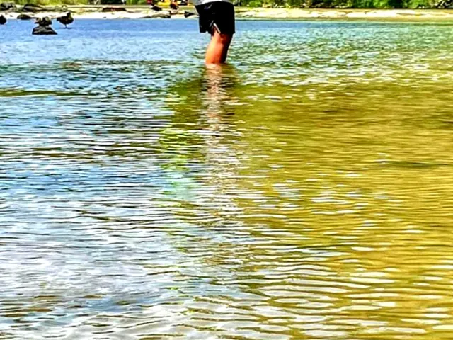 a backyard of a house with lots of water fountain