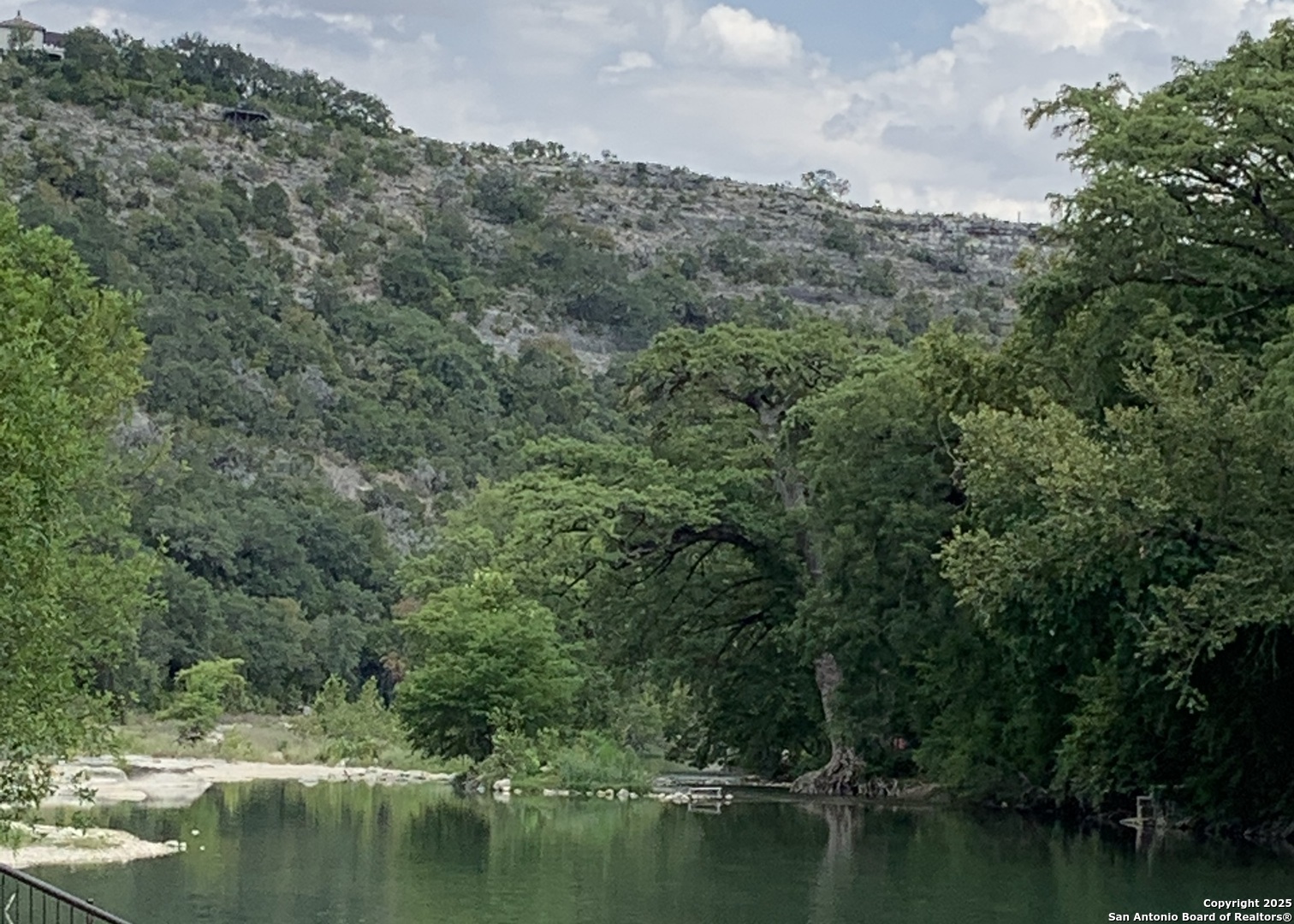 443 Arthur Court Spring Branch, TX 78070 - Photo 13 of 22 a view of a lake with houses in back