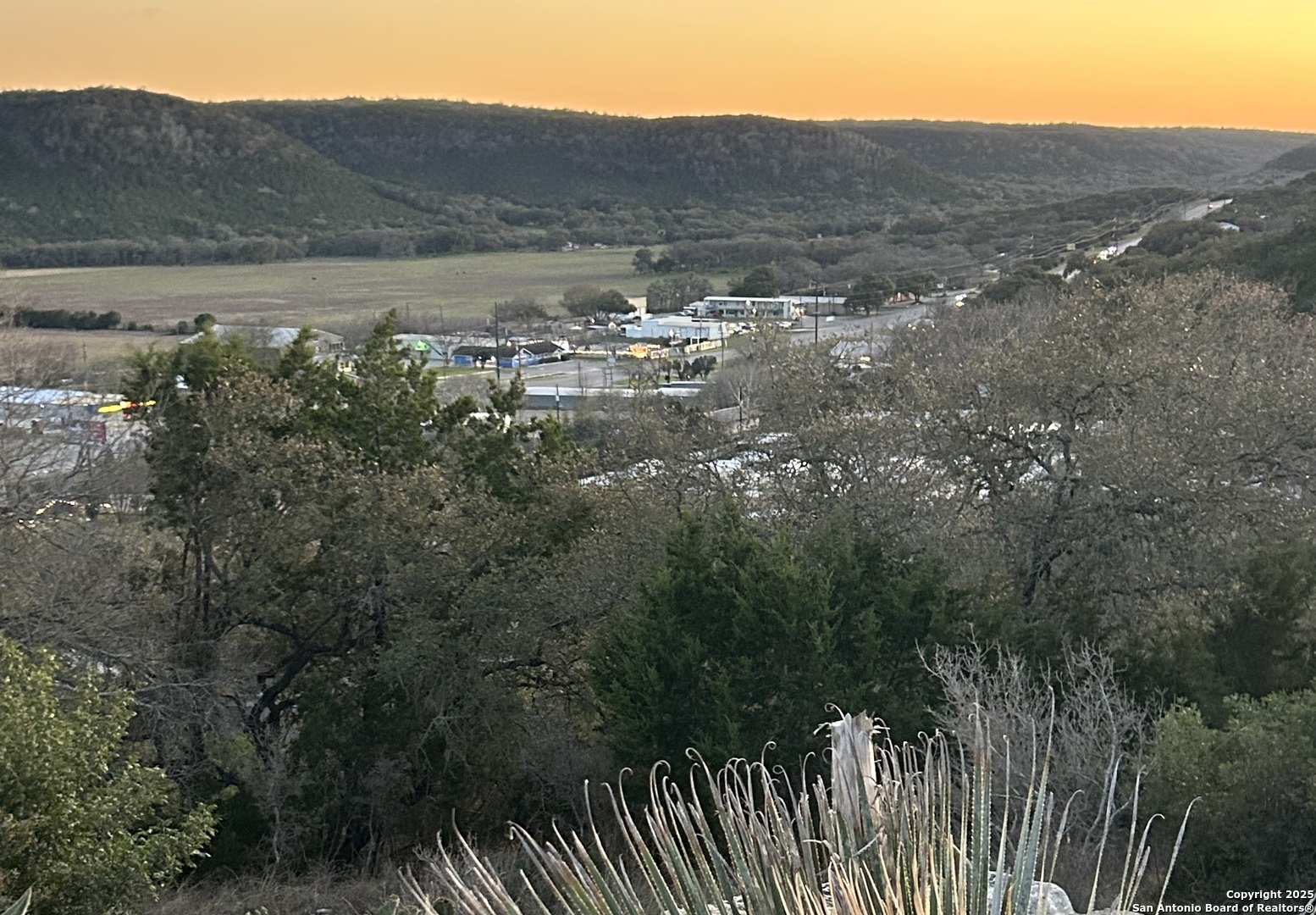 443 Arthur Court Spring Branch, TX 78070 - Photo 20 of 22 a view of a town with mountains in the background