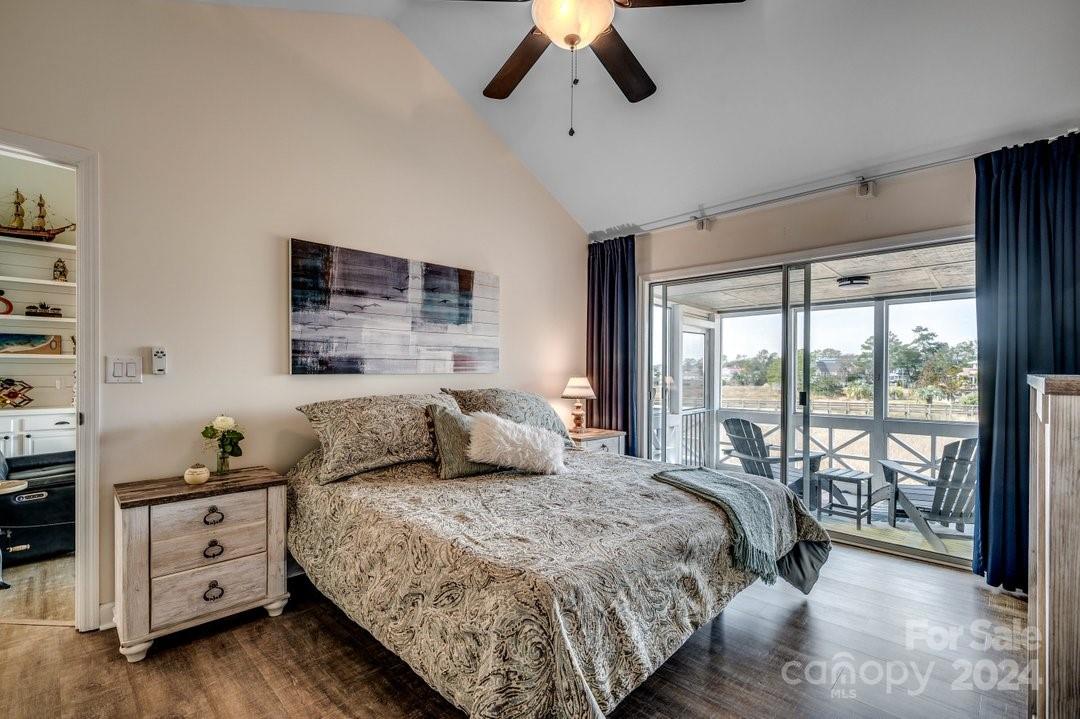 4396 Baldwin Avenue, Unit 40 Little River, SC 29566 - Photo 11 of 24 a bedroom with a bed and a window