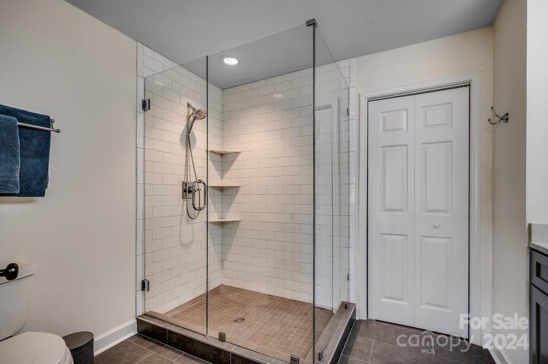 4396 Baldwin Avenue, Unit 40 Little River, SC 29566 - Photo 14 of 24 a bathroom with a shower