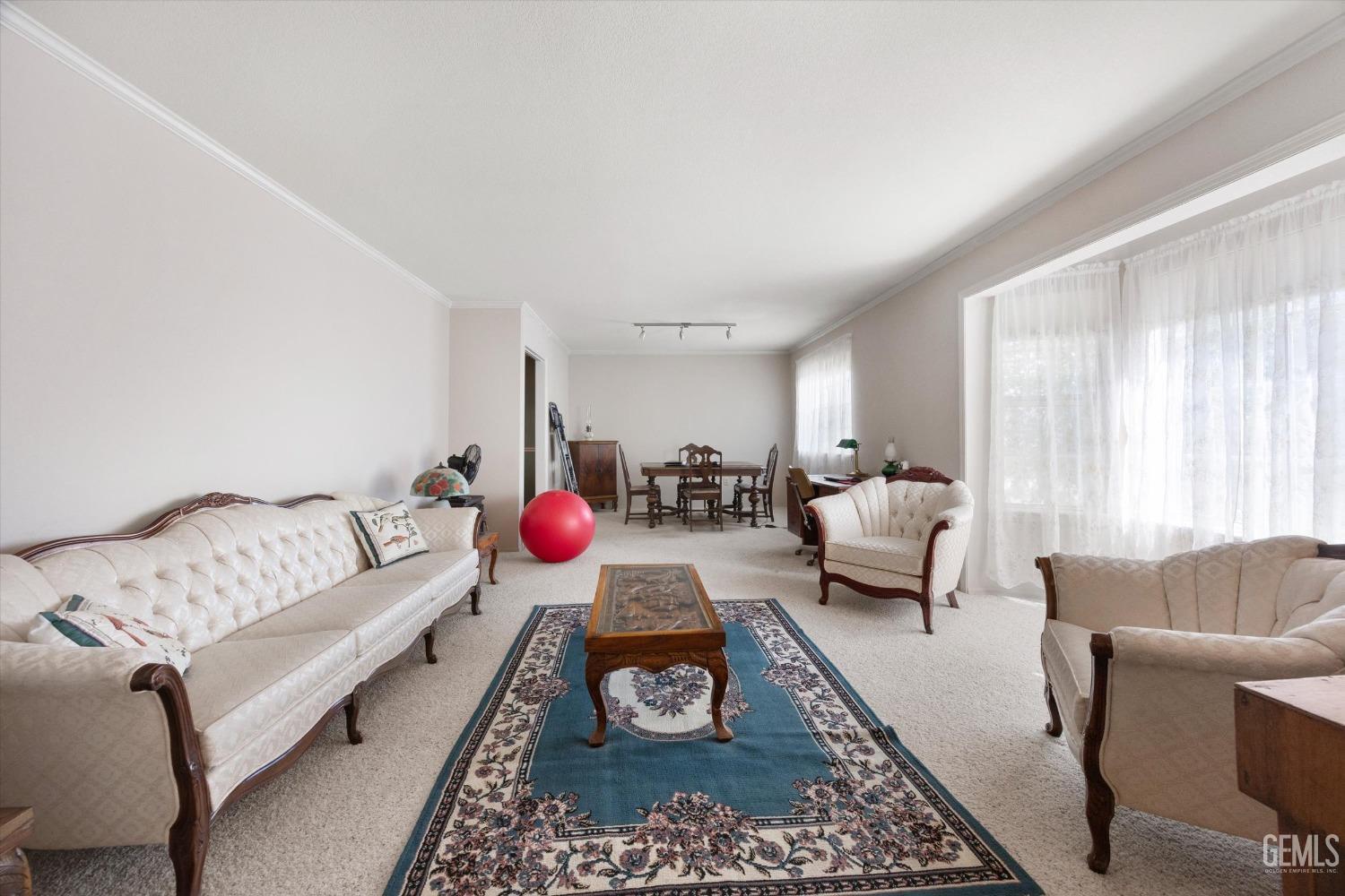 Undisclosed Address Tehachapi, CA 93561 - Photo 12 of 47 a living room with furniture and a rug