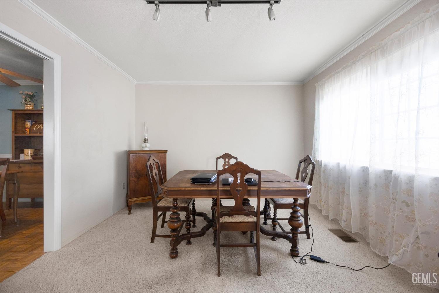 Undisclosed Address Tehachapi, CA 93561 - Photo 15 of 47 a view of a dining room with furniture and window