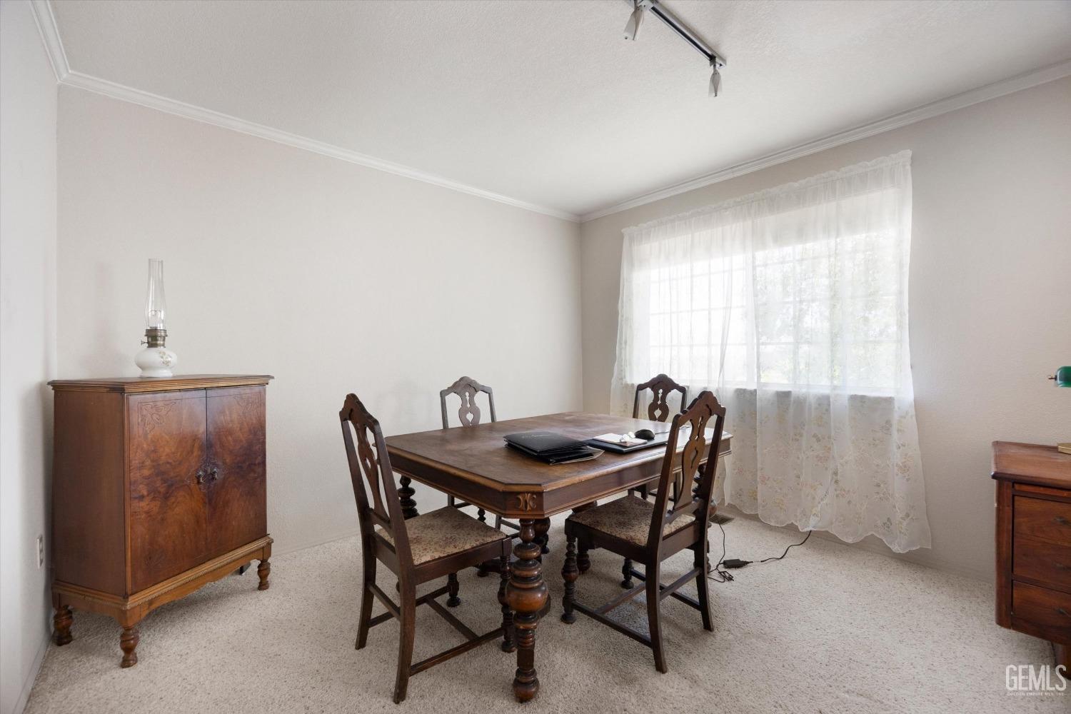Undisclosed Address Tehachapi, CA 93561 - Photo 16 of 47 a dining room with furniture and window