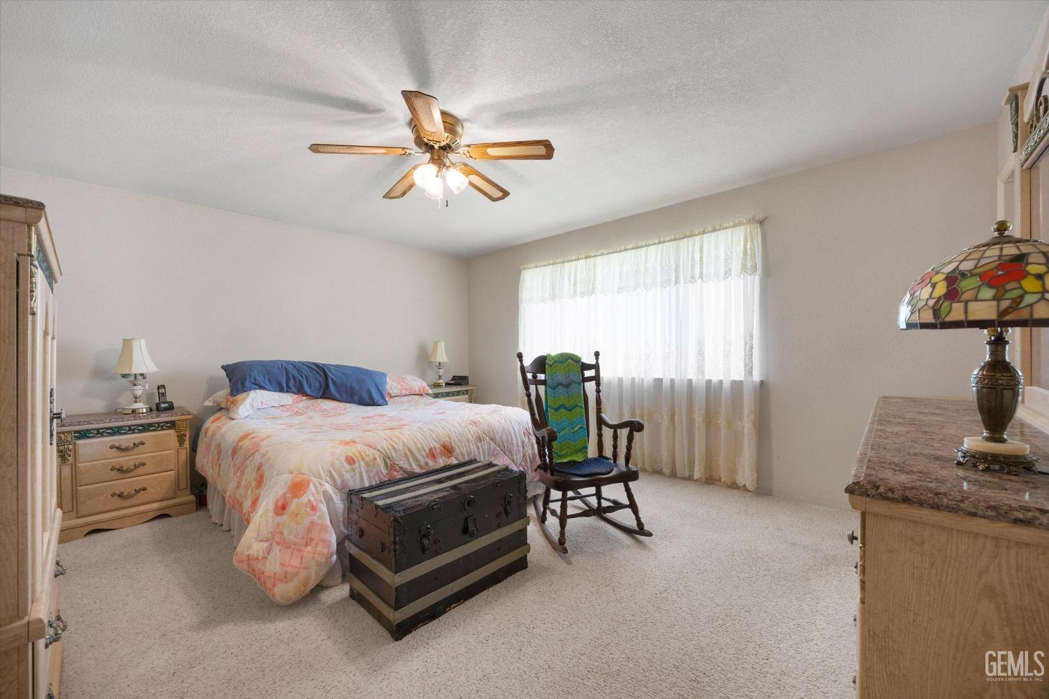 Undisclosed Address Tehachapi, CA 93561 - Photo 24 of 47 a bed room with a bed furniture and a window