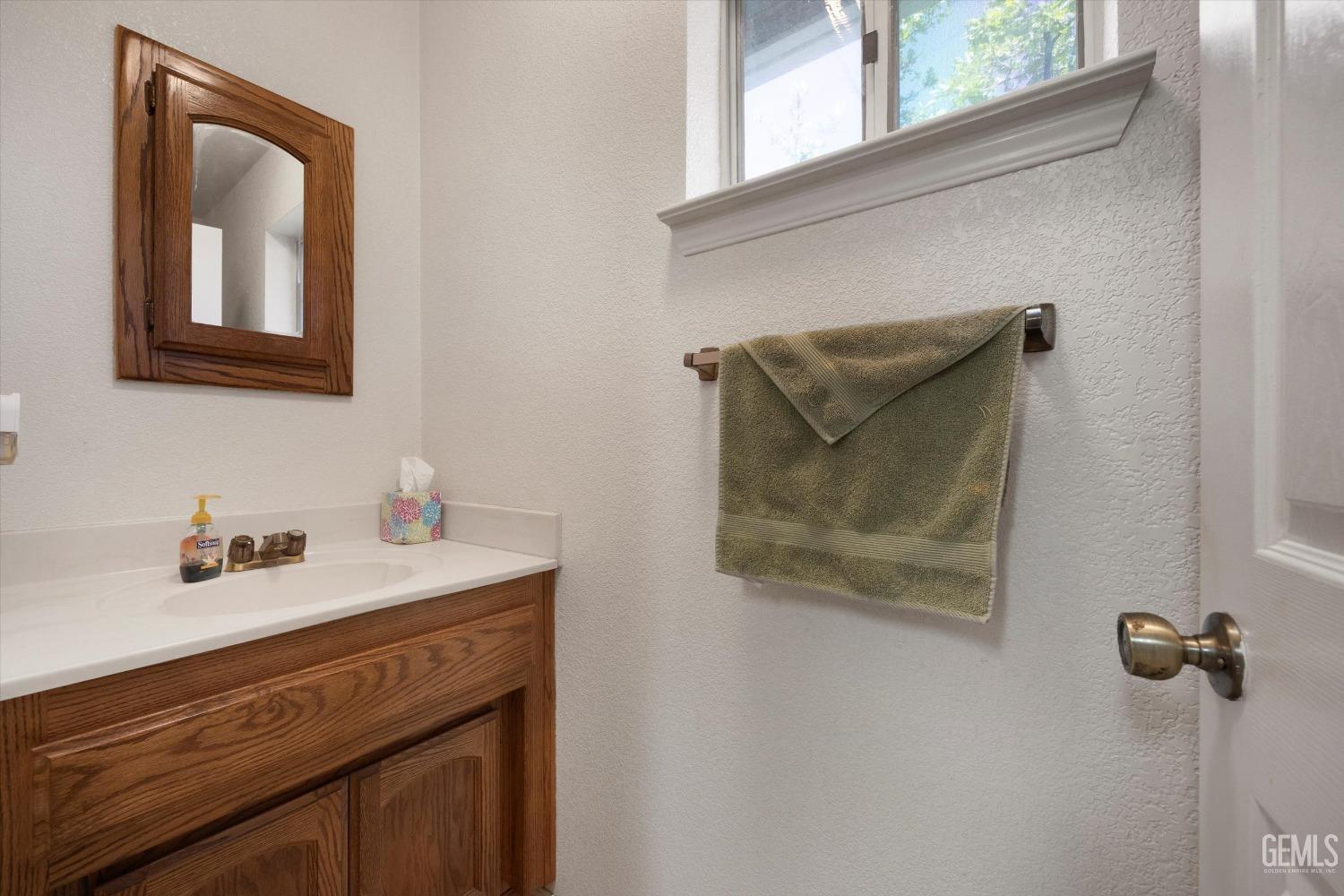 Undisclosed Address Tehachapi, CA 93561 - Photo 31 of 47 a bathroom with a sink and a mirror