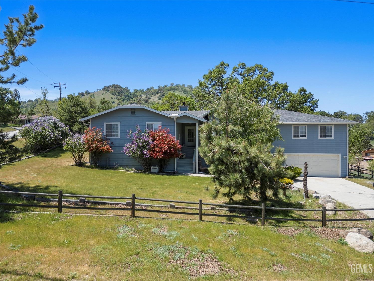 Undisclosed Address Tehachapi, CA 93561 - Photo 4 of 47 a swimming pool covered with trees in the background