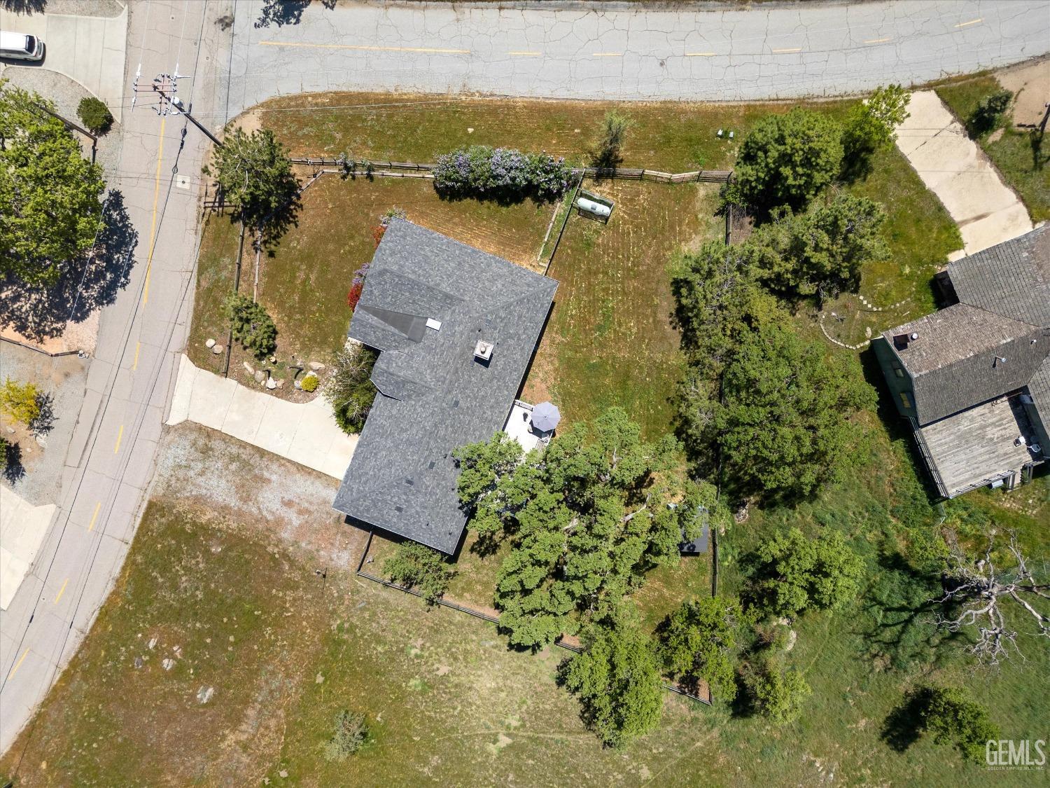 Undisclosed Address Tehachapi, CA 93561 - Photo 6 of 47 an aerial view of residential houses with outdoor space