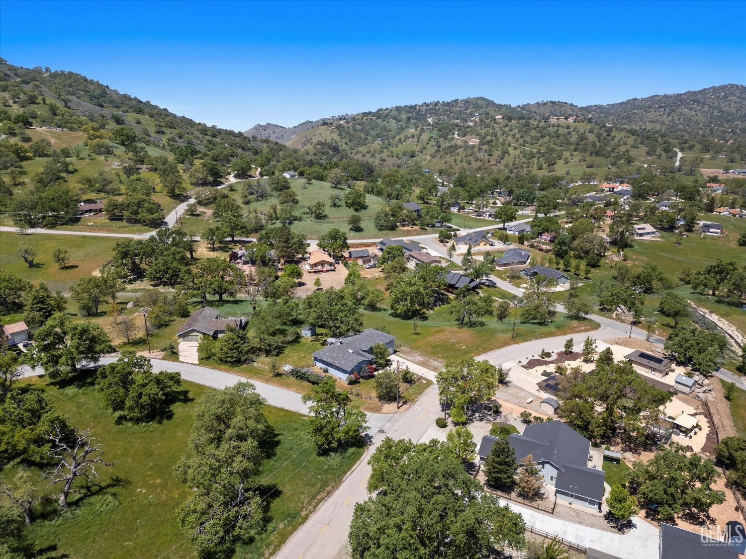 Undisclosed Address Tehachapi, CA 93561 - Photo 8 of 47 an aerial view of residential houses with outdoor space and street view