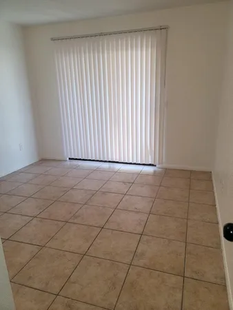 a view of a room with a window