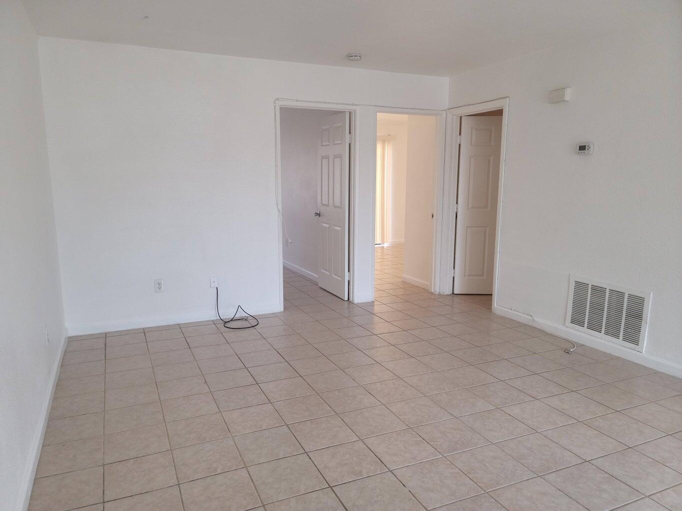 43965 Towne Street Indio, CA 92201 - Photo 20 of 31 a view of an empty room and window