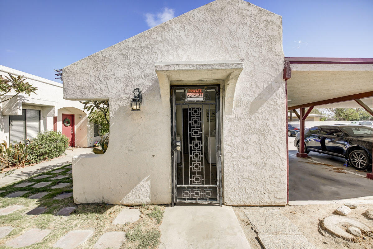 43965 Towne Street Indio, CA 92201 - Photo 25 of 31 a view of a car parked front of a building