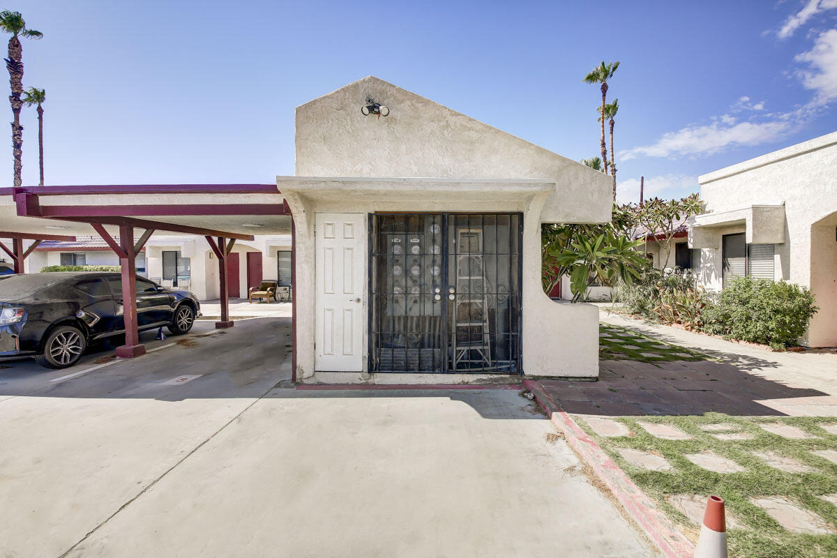 43965 Towne Street Indio, CA 92201 - Photo 28 of 31 a view of a building with car parked