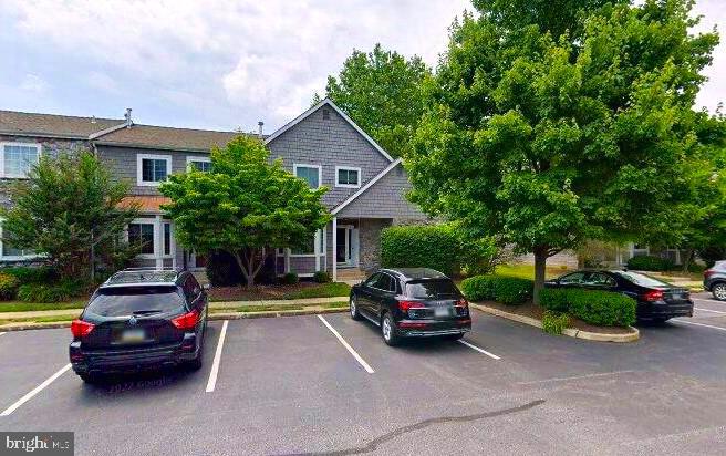 a car parked in front of a house
