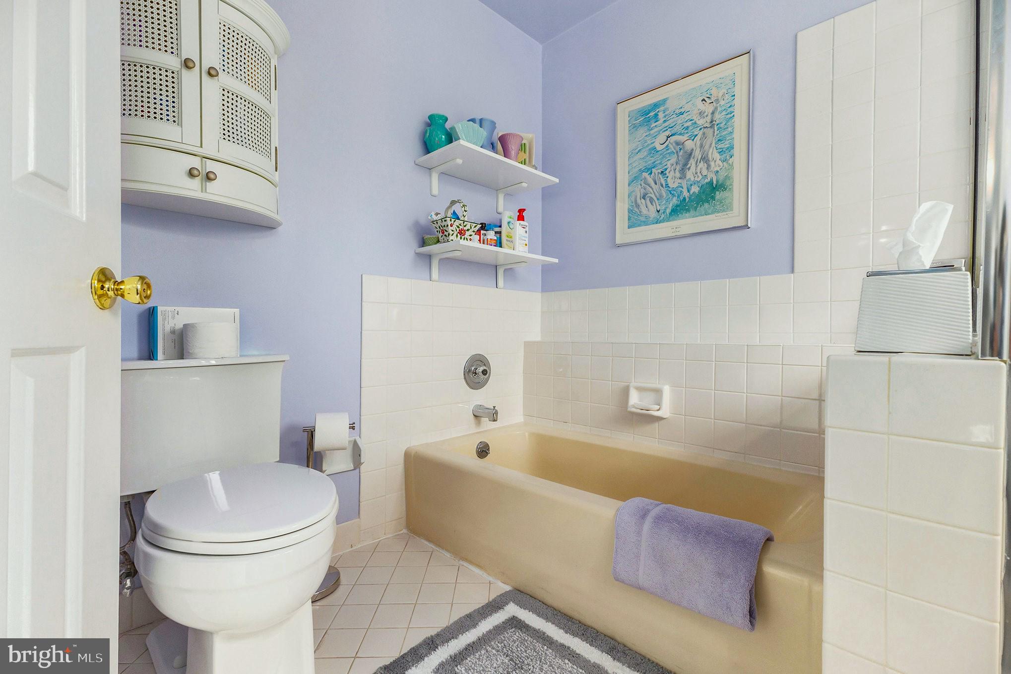 6 Lantern Lane Chesterbrook, PA 19087 - Photo 21 of 37 a bathroom with a toilet a sink and bathtub