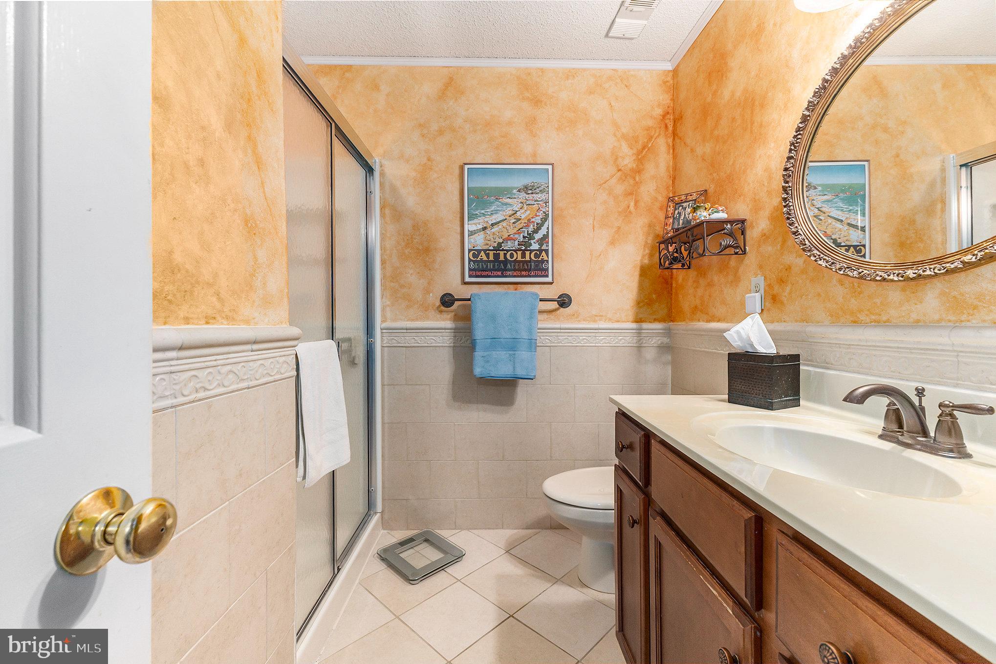 6 Lantern Lane Chesterbrook, PA 19087 - Photo 26 of 37 a bathroom with a sink vanity and a mirror