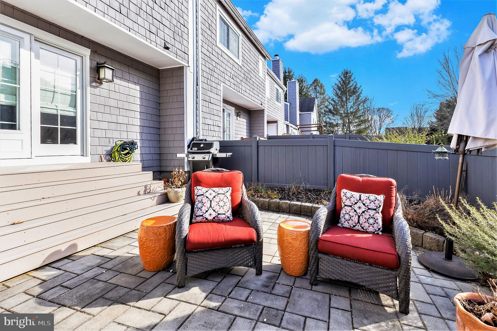 6 Lantern Lane Chesterbrook, PA 19087 - Photo 30 of 37 a outdoor space with patio couches and a potted plant on a table