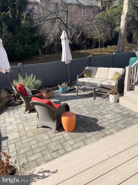 6 Lantern Lane Chesterbrook, PA 19087 - Photo 34 of 37 a backyard of a house with barbeque oven table and chairs