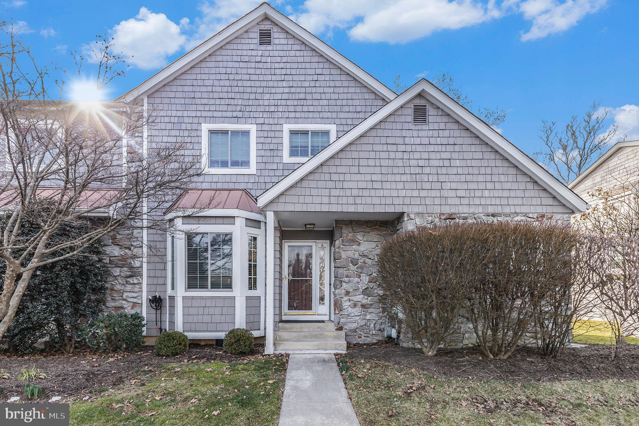 6 Lantern Lane Chesterbrook, PA 19087 - Photo 4 of 37 a front view of a house with garden
