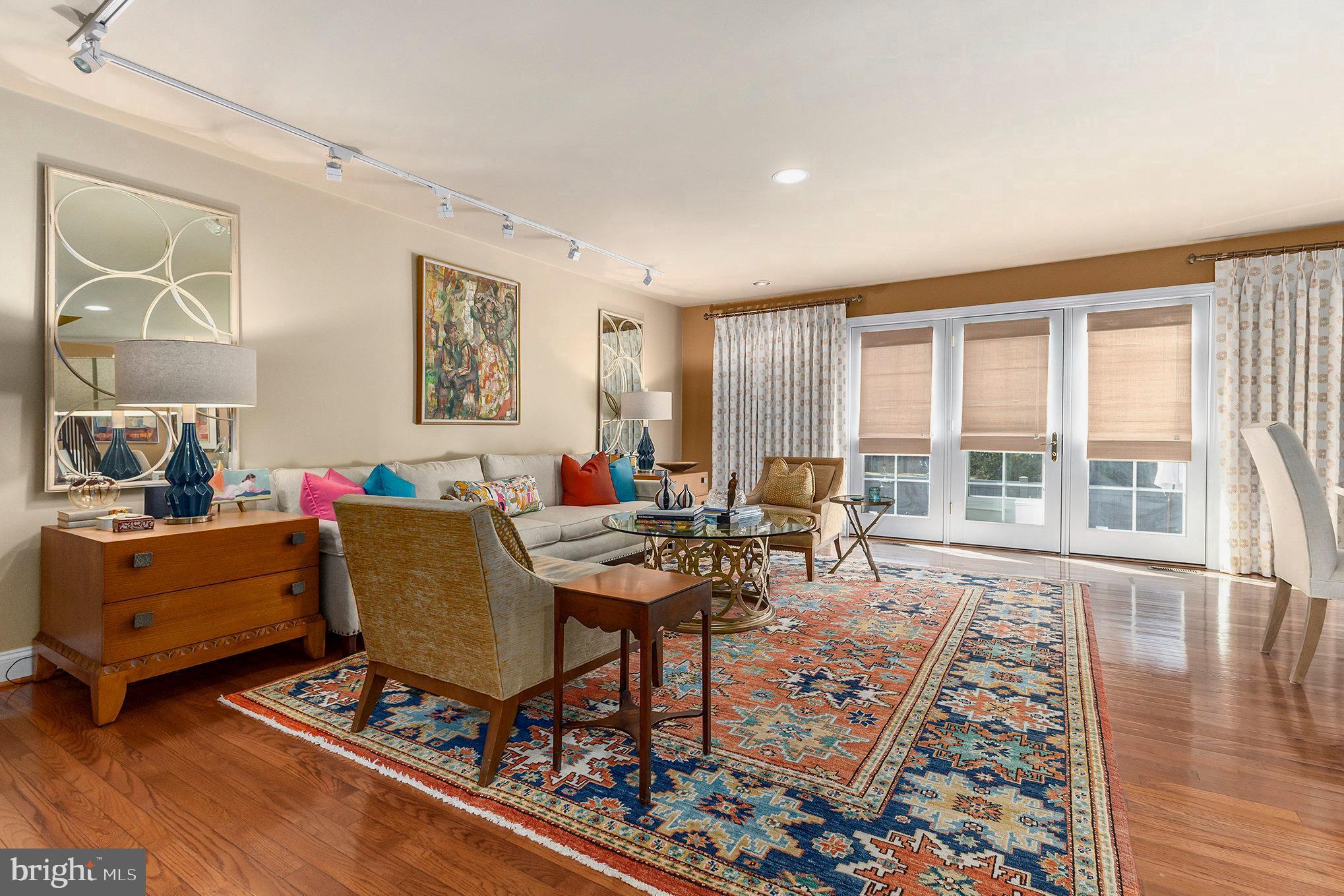 6 Lantern Lane Chesterbrook, PA 19087 - Photo 10 of 37 a living room with furniture and a floor to ceiling window