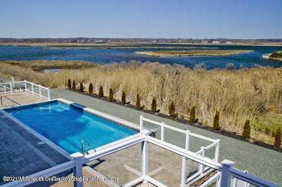 13 Riverview Road Monmouth Beach, NJ 07750 - Photo 3 of 5 a view of an ocean and beach