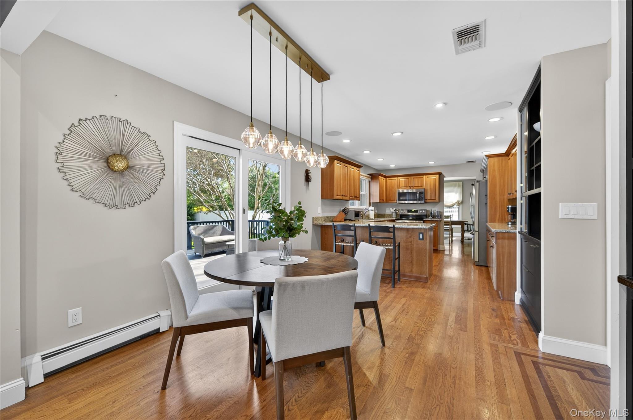 21 Midland Street Cold Spring Harbor, NY 11724 - Photo 15 of 44 a dining room with furniture and wooden floor