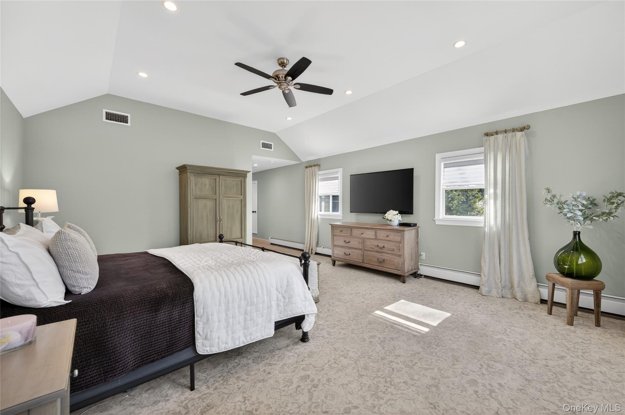 21 Midland Street Cold Spring Harbor, NY 11724 - Photo 24 of 44 a bedroom with bed tv and window