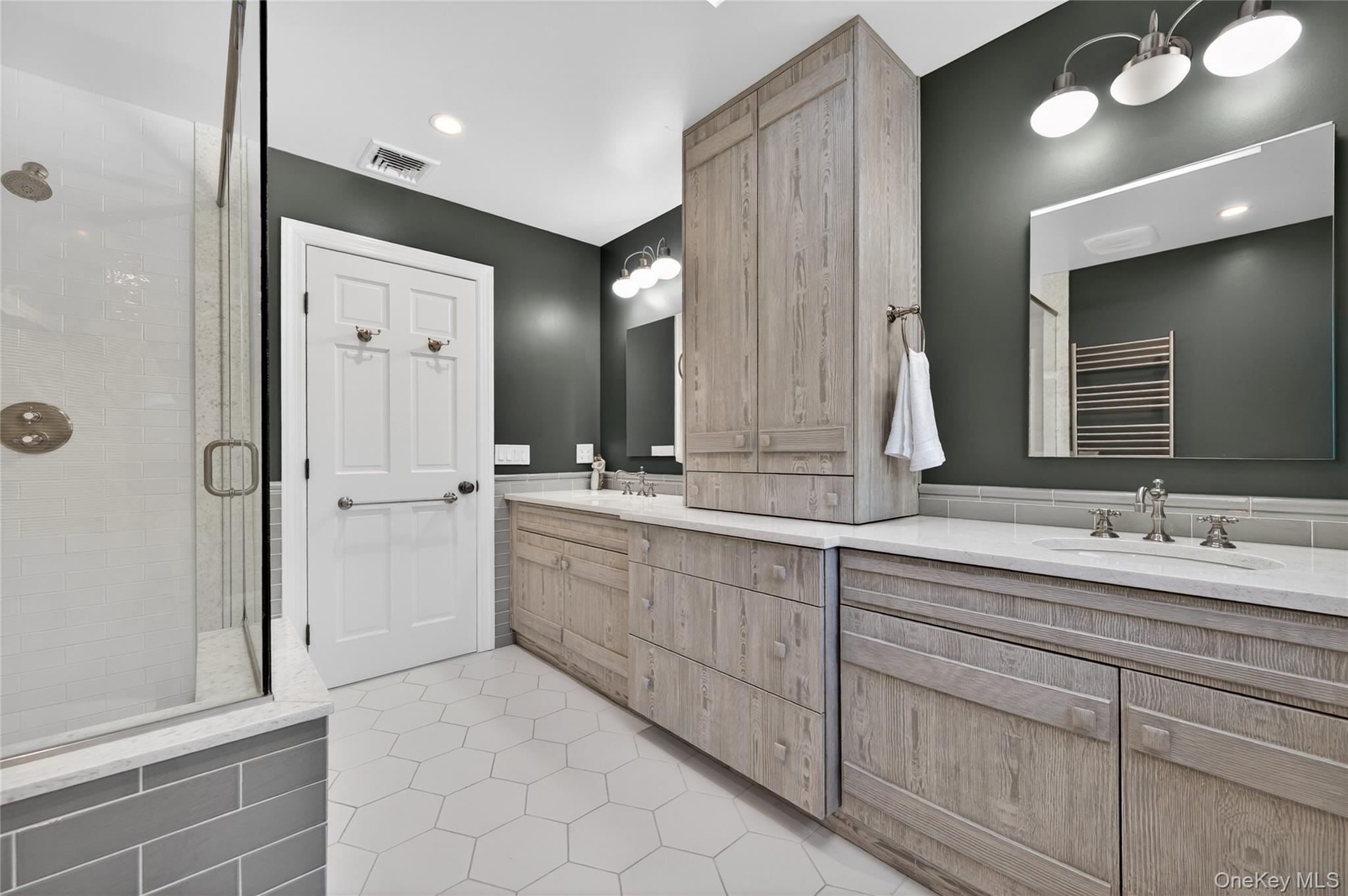 21 Midland Street Cold Spring Harbor, NY 11724 - Photo 26 of 44 a spacious bathroom with a double vanity sink mirror and double