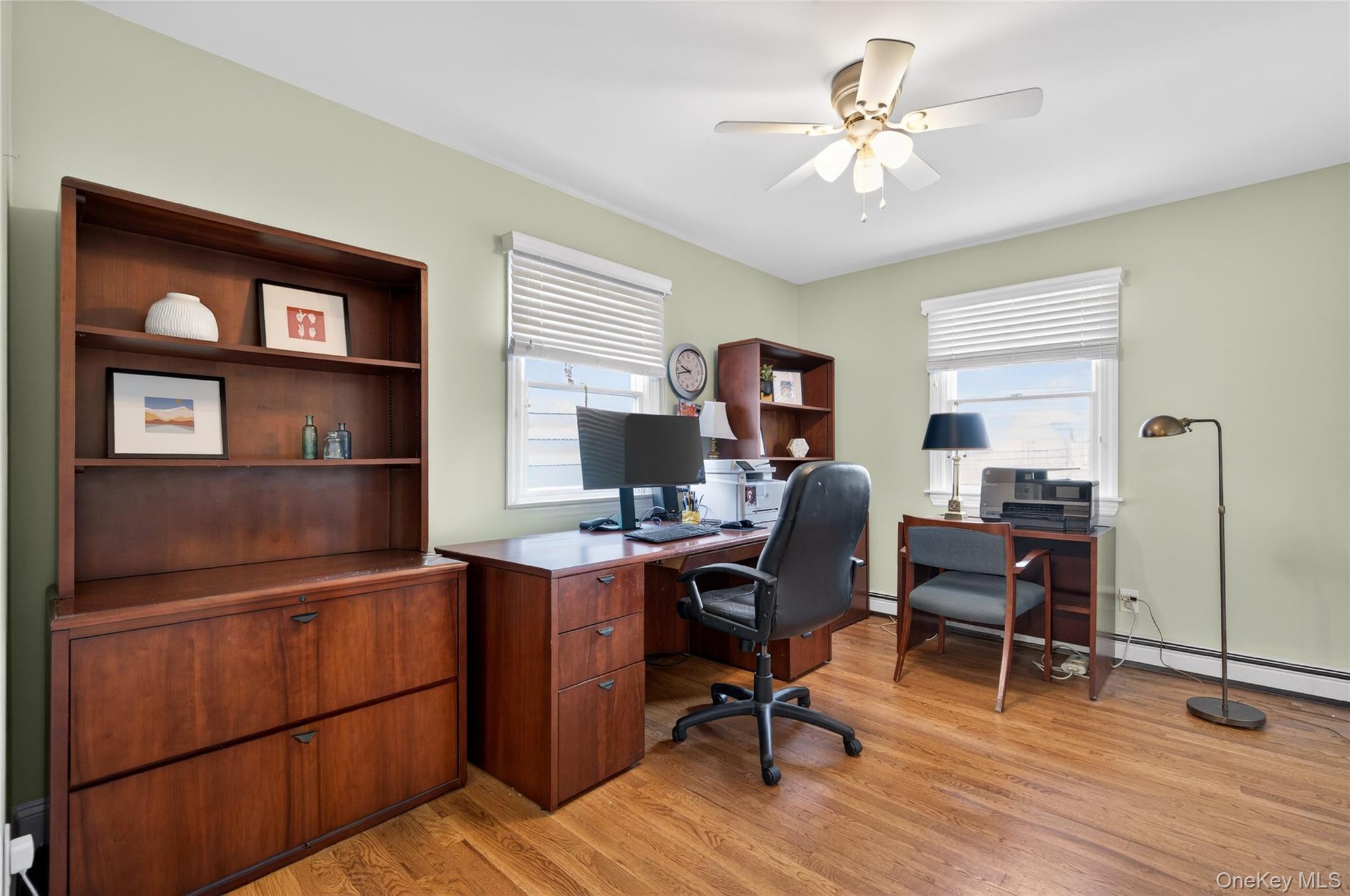 21 Midland Street Cold Spring Harbor, NY 11724 - Photo 31 of 44 a view of a workspace with furniture and a window