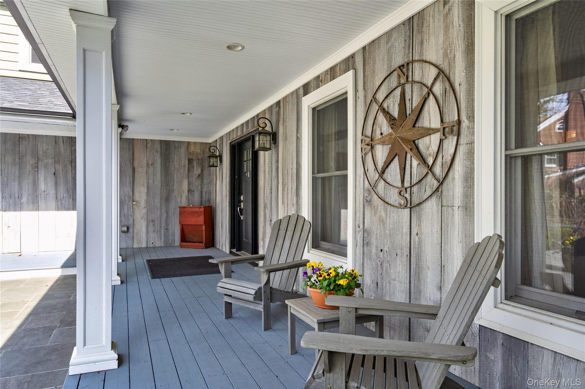 21 Midland Street Cold Spring Harbor, NY 11724 - Photo 6 of 44 a dining room with furniture entryway and wooden floor