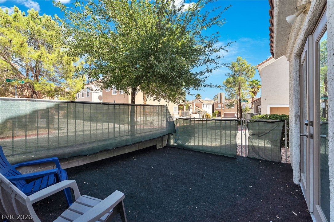 1409 Sycamore Spring Court Las Vegas, NV 89128 - Photo 27 of 28 This outdoor space offers a private retreat with an accessible entrance.