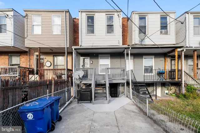 a view of a cafe with outdoor seating