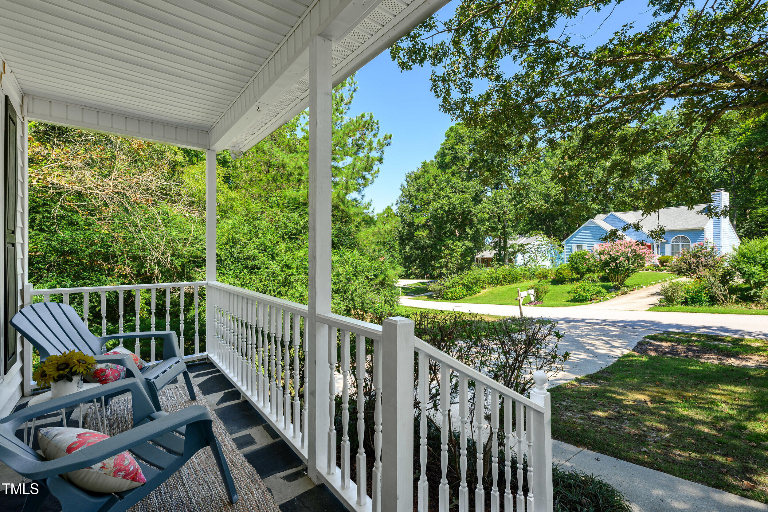 2213 Bufflehead Road Raleigh, NC 27616 - Photo 4 of 30 a view of a wooden deck and a garden