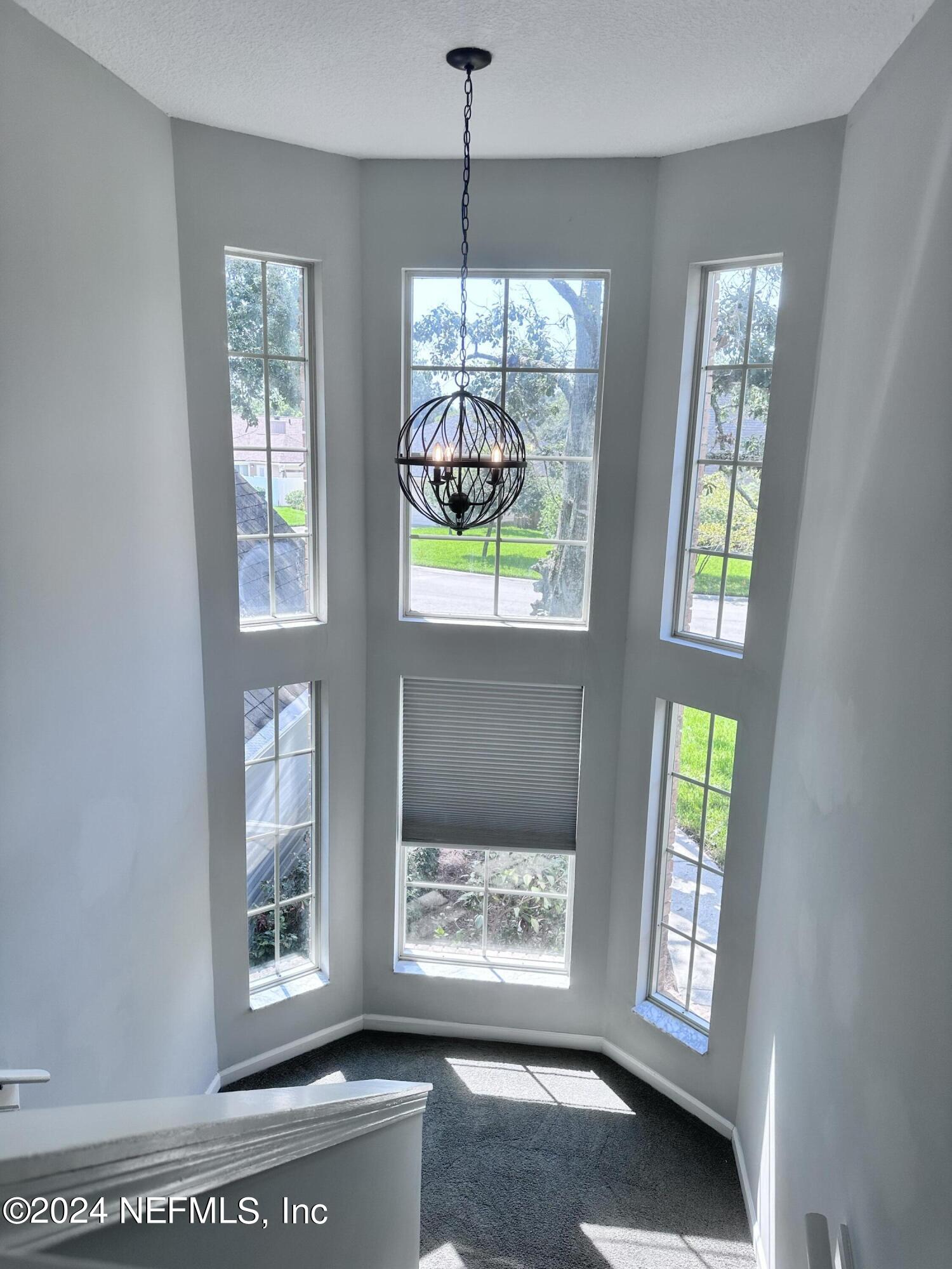 4521 Trevi Drive Jacksonville, FL 32257 - Photo 11 of 24 a window in an empty room with windows