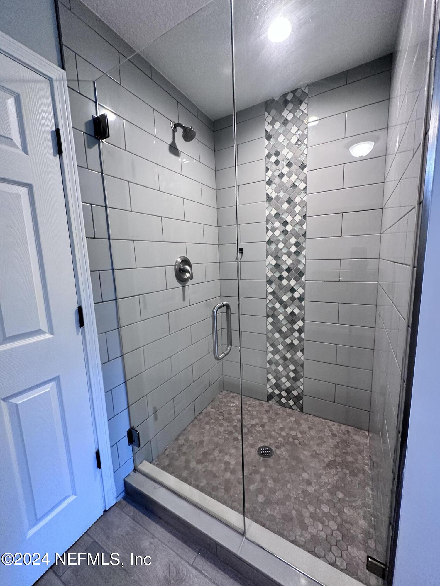 4521 Trevi Drive Jacksonville, FL 32257 - Photo 13 of 24 a bathroom with a shower